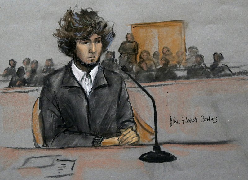 In this courtroom sketch, Boston Marathon bombing suspect Dzhokhar Tsarnaev is depicted sitting in federal court in Boston on Thursday, Dec. 18, 2014, for a final hearing before his trial begins in January. Tsarnaev is charged with the April 2013 attack that killed three people and injured more than 260. He could face the death penalty if convicted. 