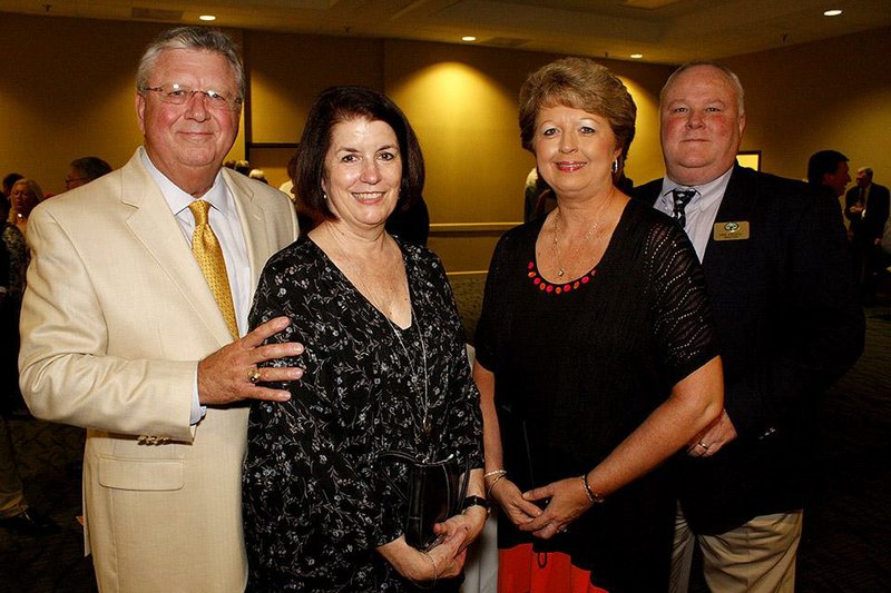 Arkansas Game & Fish Foundation president Chuck and Cathy Dicus with Lise and Mike Knoedl (far right) of Fordyce at the Arkansas Game and Fish Foundation Outdoor Hall of Fame induction at the Statehouse Convention Center.