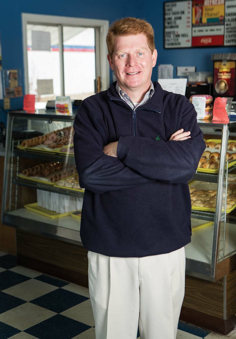 Allen Lipsmeyer stands in front of a case inside Daylight Donuts in Morrilton, which he owns and runs with his son, Kyle Lawton. Morrilton Mayor-elect Lipsmeyer said his wife, Stephanie, will run the business when he takes office. The 44-year-old Conway native has been in politics since he was 18, and he moved to Morrilton, his wife’s 
hometown, in 1999.