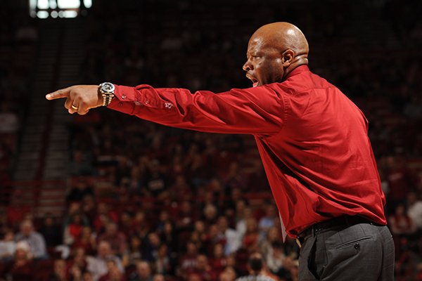 Arkansas coach Mike Anderson directs his offense against Dayton during the second half Saturday, Dec. 13, 2014, at Bud Walton Arena in Fayetteville.