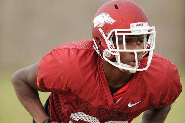 Arkansas safety Josh Liddell works through drills during practice Saturday, Dec. 13, 2014, at the university's practice facility in Fayetteville.