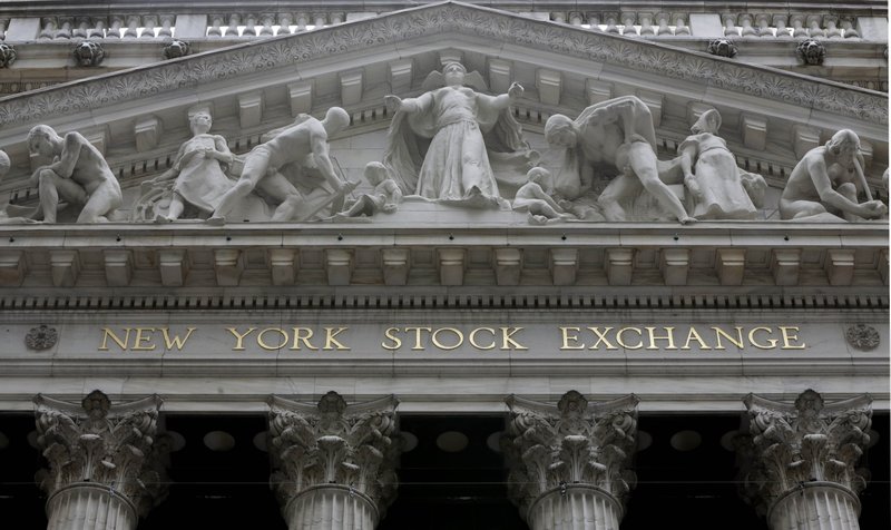 This Thursday, Oct. 2, 2014, file photo, shows the facade of the New York Stock Exchange. Major stock indexes are creeping higher on Friday, Dec. 19, 2014, as the market comes off a massive two-day rally spurred by the Federal Reserve's assurance that it was in no hurry to hike interest rates. 