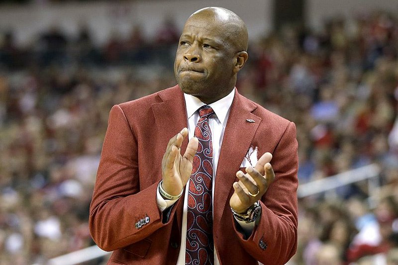 Arkansas coach Mike Anderson watches the first half of an NCAA college basketball game against Southeast Missouri State in North Little Rock, Ark., Saturday, Dec. 20, 2014. (AP Photo/Danny Johnston)