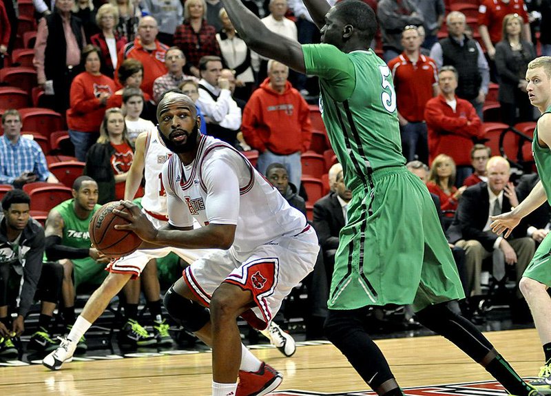 Arkansas State forward Anthony Livingston finished with 20 points and 20 rebounds in the Red Wolves’ 67-58 victory over Marshall on Saturday at the Convocation Center in Jonesboro.