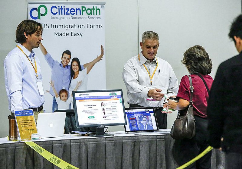 People attend a forum earlier this month in Los Angeles to educate immigrants on measures ordered by President Barack Obama last month.