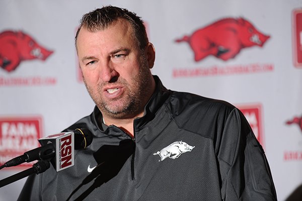 Arkansas coach Bret Bielema speaks to members of the media Monday, Dec. 22, 2014, during a press conference ahead of the Razorbacks' Dec. 29 bowl game with Texas in Houston.