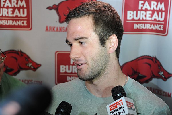 Quarterback Ty Storey speaks to members of the media Monday, Dec. 22, 2014, during a press conference ahead of the Razorbacks' Dec. 29 bowl game with Texas in Houston. 