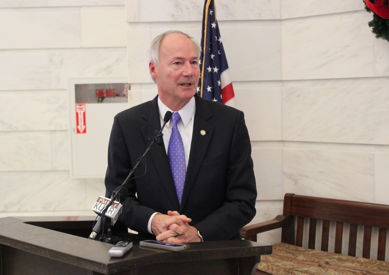 Gov.-elect Asa Hutchinson speaks Monday at a news conference at the state Capitol.