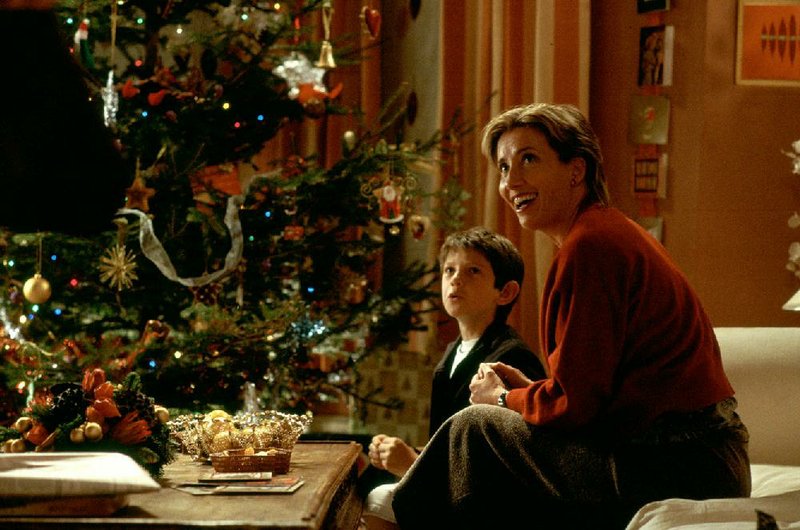  newmovlove --	Karen (EMMA THOMPSON) and son Bernie (WILLIAM WADHAM) prepare for Christmas and all its possibilities in Richard Curtis’ romantic comedy Love Actually.  
	Photo Credit:  Peter Mountain
	©2003 Universal Studios.  All Rights Reserved.
