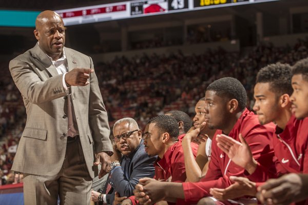 Arkansas head coach Mike Anderson talks to the bench between plays against Wisconsin-Milwaukee Monday, Dec. 22, 2014 in the second half at Bud Walton Arena in Fayetteville. The Razorbacks won 84-54.