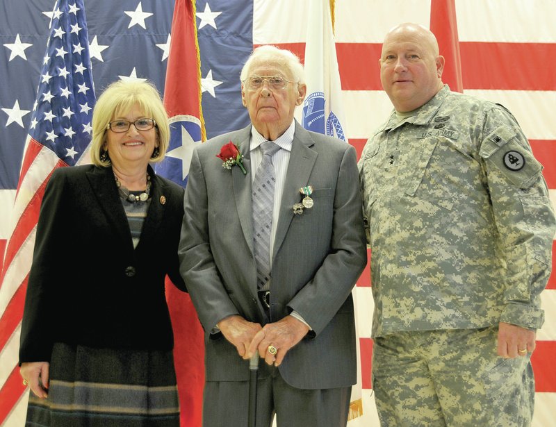 Submitted Photo Alfred L. Morris (center) is pictured with Congresswoman Diane Black and Major General Max Haston, Adjutant General, Tennessee, at his award ceremony on Nov. 7.