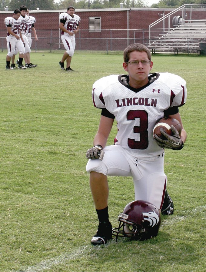 MARK HUMPHREY ENTERPRISE-LEADER Ryan Holcomb played six seasons of football at Lincoln beginning in seventh grade after receiving a letter from former Lincoln coach Brad Harris inviting all incoming seventh-graders to go out for the sport. Participating in football became an empowerment for Holcomb, who has autism, to open up socially and allow the world into his life. Holcomb, a 2014 Lincoln graduate, has been named Inspirational Athlete of the Year at Lincoln.