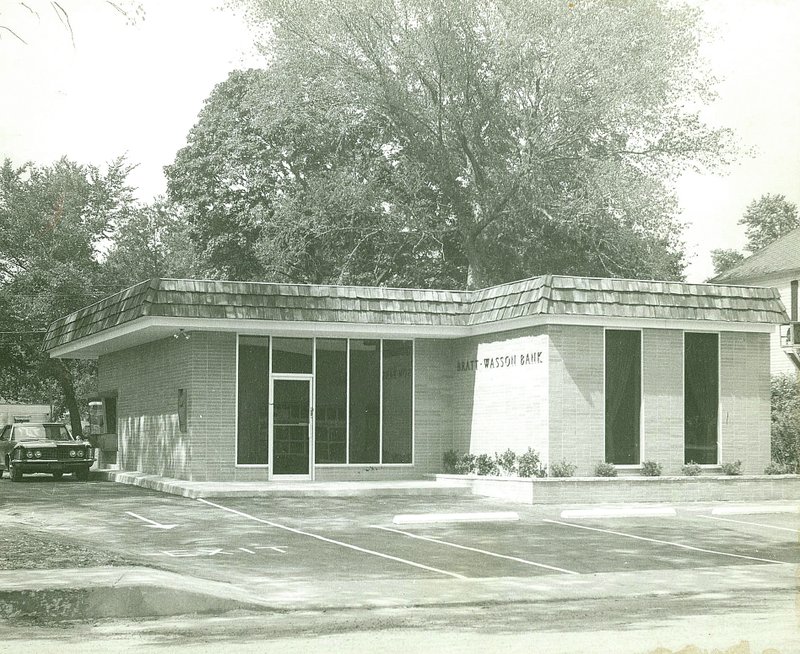 Submitted Photo The old Bratt-Wasson Bank building, picturd here in 1966 when it opened and most recently home to the Gentry branch of Arvets Bank, is no more. Demolition began Monday. The Arvest Bank branch is now located at it&#8217;s new 3,185-square-foot facility nextdoor. Once demolotion is completed, the lot will be converted into parking for the new banking facility.