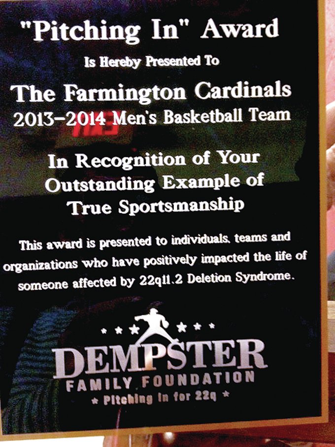 LYNN KUTTER ENTERPRISE-LEADER Former major league pitcher Ryan Dempsey presented this award to Farmington&#8217;s boys basketball team recognizing their sportsmanship in helping Prairie Grove special needs player McKay Gregson score in the waning moments of a rivalry game on Feb. 14.
