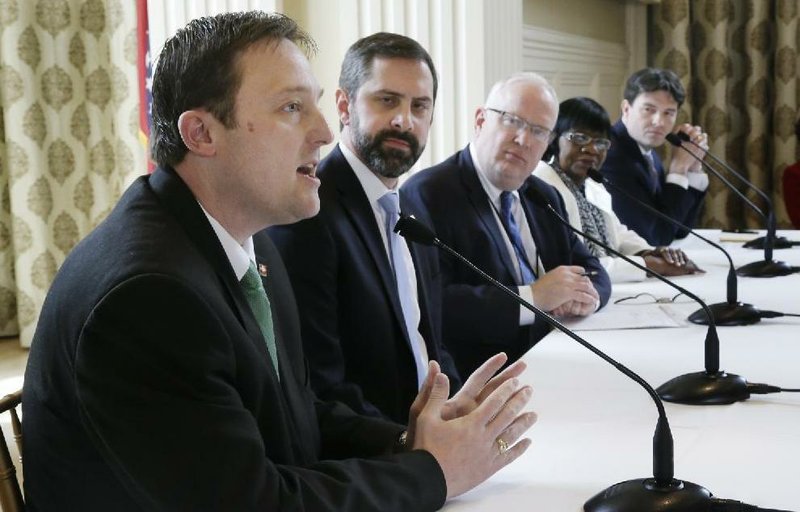 Arkansas House Speaker-designate Jeremy Gillam, R-Judsonia, far left, speaks at a meeting of the Political Animals Club in Little Rock in this March 2014 file photo. 