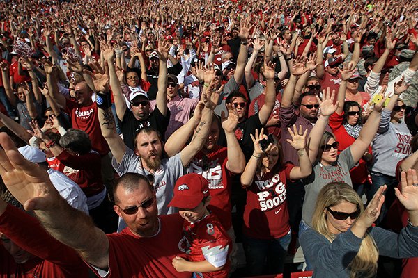 Arkansas fans cheer prior to a game against Georgia on Saturday, Oct. 18, 2014 at War Memorial Stadium in Little Rock. 