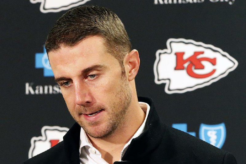 Kansas City Chiefs quarterback Alex Smith (11) answers a question during a post-game press conference following a 20-12 loss to the Pittsburgh Steelers in an NFL football game in Pittsburgh, Sunday, Dec. 21, 2014. (AP Photo/Tom Puskar)