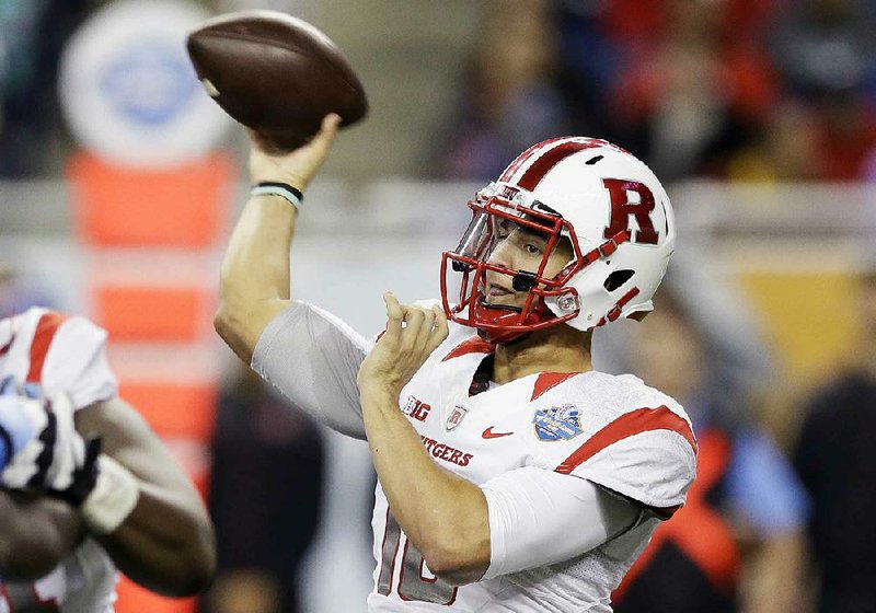 Rutgers quarterback Gary Nova throws during the first half of the Quick Lane Bowl NCAA college football game against North Carolina, Friday, Dec. 26, 2014, in Detroit. (AP Photo/Carlos Osorio)