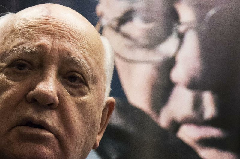 Former Soviet leader Mikhail Gorbachev speaks during a presentation of his new book "After Kremlin" in a book store in Moscow, Russia, Friday, Dec. 26, 2014. Gorbachev criticized the West for the latest tensions with Russia, saying that Russian President Vladimir Putin was responding to Western moves. (AP Photo/Alexander Zemlianichenko)