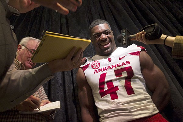 Arkansas linebacker Martrell Spaight laughs while speaking to reporters Saturday, Dec. 27, 2014 at the Westin Galleria hotel in Houston. 
