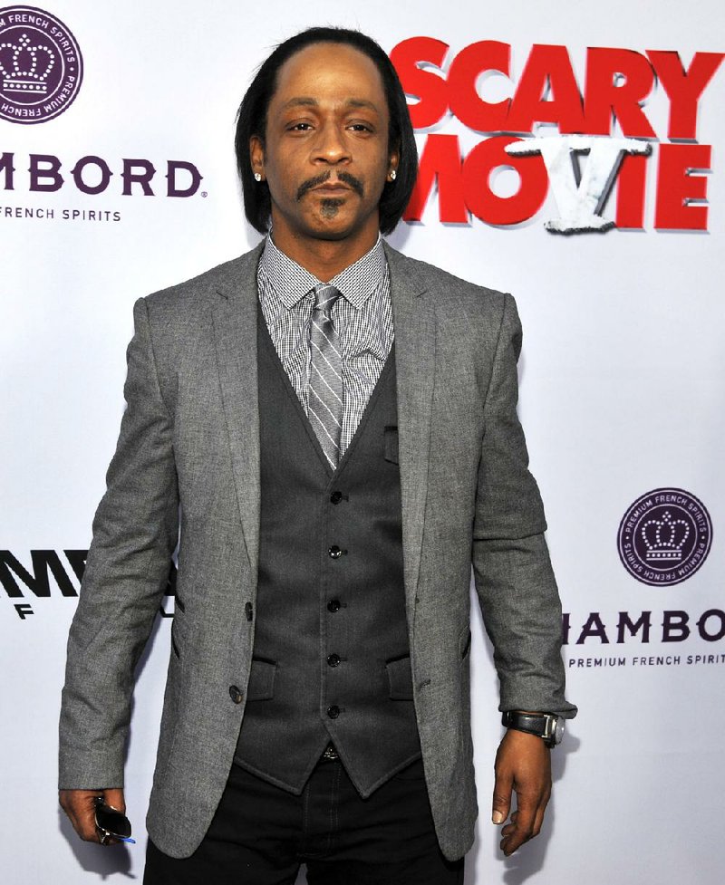 FILE - In this April 11, 2013 file photo, Katt Williams, a cast member in "Scary Movie V," poses at the Los Angeles premiere of the film at the Cinerama Dome, in Los Angeles. Williams pleaded not guilty to robbery in a Los Angeles courtroom on Wednesday, Dec. 24, 2014. The comedian is charged along with Death Row Records founder Suge Knight with taking a celebrity photographer’s camera during an incident in Beverly Hills in September 2014.  (Photo by Chris Pizzello/Invision/AP, File)
