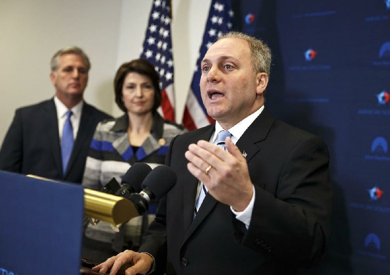 In this Nov. 18, 2014 file photo, House Majority Whip Steve Scalise of La., right, with House Majority Leader Kevin McCarthy of Calif., left, and Rep. Cathy McMorris Rodgers, R-Wash., speaks to reporters on Capitol Hill in Washington, following a House GOP caucus meeting. Scalise acknowledged that he once addressed a gathering of white supremacists. Scalise served in the Louisiana Legislature when he appeared at a 2002 convention of the European-American Unity and Rights Organization. Now he is the third-highest ranked House Republican in Washington. 