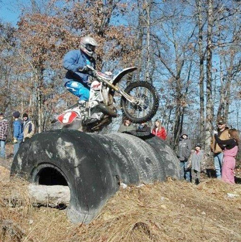 Submitted photo A rider jumps his dirt bike over a tire obstacle in the EnduroCross section of the Almosta Race course near Decatur. The race is held on New Years Day each year on the Wildcat Ranch, 9897 Almosta Road, just off Bethlehem Road. Proceeds benefit the RiderDown Foundation.