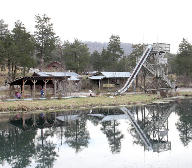 After Dogpatch&#8217;s closing, salvageable rides were sold to various parks. Those that remained, like the Wild Water Rampage, cast a stark silhouette against the rugged landscape.