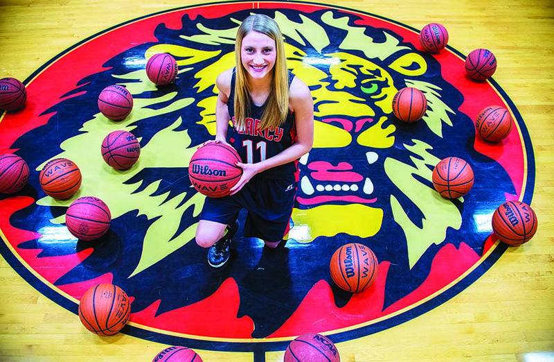 Victoria Sanders, seen here in the gymnasium at Searcy High School, has been chosen as the female recipient of the Wendy’s High School Heisman Scholar Award for 2014 in Arkansas.