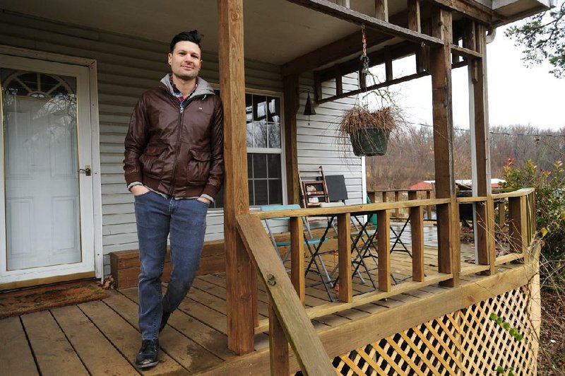 Jon Allen, owner of Onyx Coffee Lab in Fayetteville and Springdale, lives in a former trout farm in Southern Springdale. His favorite spot in his house is his porch which overlooks a pond that once housed trout.