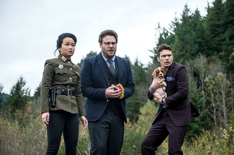 Sook (Diana Bang), Aaron (Seth Rogen) and Dave Skylark (James Franco) seek to disrupt the government of North Korea in The Interview.