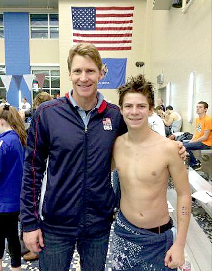 Photo Submitted Siloam Springs sophomore swimmer Brittan Butler, right, poses for a photo with former Olympic gold medalist swimmer Josh Davis at the 23rd annual Oklahoma Elite Pro Am swim meet in Edmond, Okla. Butler competed in the event with his swim club, the Razorback Aquatic Club Aquahawgs.