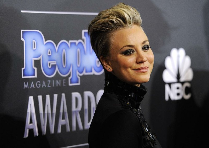 Kaley Cuoco arrives at The People Magazine Awards at the Beverly Hilton hotel on Thursday, Dec. 18, 2014, in Beverly Hills, Calif. (Photo by Chris Pizzello/Invision/AP)