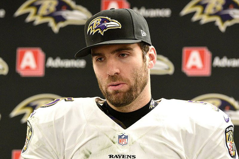Baltimore Ravens quarterback Joe Flacco (5) talks to reporters during the news conference after the NFL wildcard playoff football game against the Pittsburgh Steelers, Saturday, Jan. 3, 2015, in Pittsburgh. The Ravens won 30-17. (AP Photo/Don Wright)