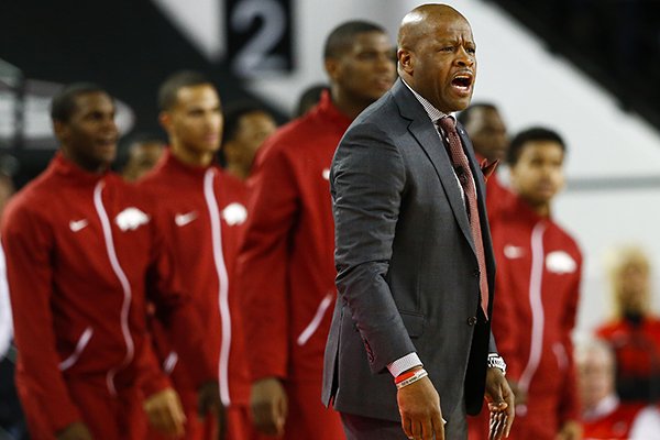 Arkansas head coach Mike Anderson directs his team from the bench in the first half of an NCAA college basketball game against Georgia Tuesday, Jan. 6, 2015, in Athens, Ga. (AP Photo/John Bazemore)