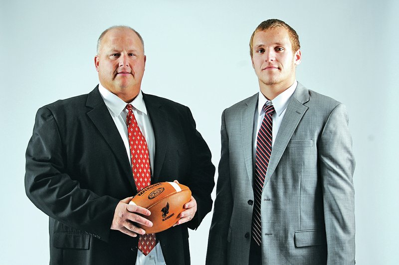 Staff Photo J.T. Wampler Tony Travis, left, and Seth Brumley, both of Pea Ridge, are the All-NWA Media Coach of the Year and Player of the Year, respectively, for Class 5A and below.