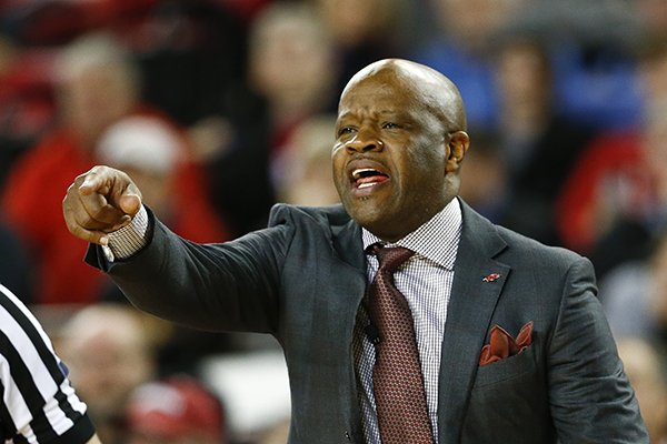Arkansas head coach Mike Anderson yells from the sideline in the second half of an NCAA college basketball game agains Georgia Tuesday, Jan. 6, 2015, in Athens, Ga. Arkansas won 79-75. (AP Photo/John Bazemore)