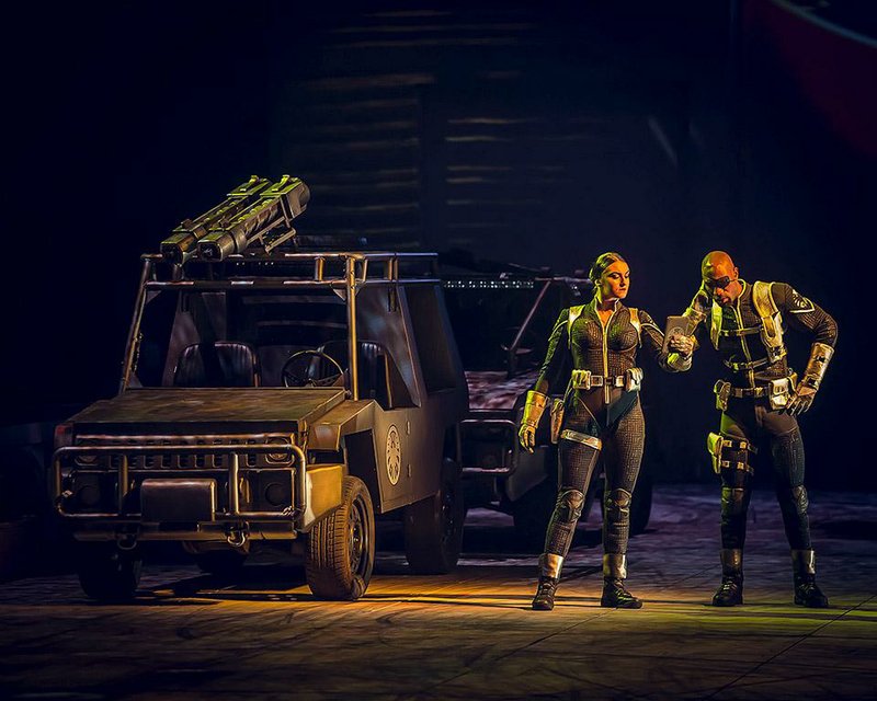 Actress Madison Embrey’s comic-book character, Maria Hill (left), plots with Marvel Comics hero Nick Fury (Romeo Brown) in Marvel Universe Live! The show opens a three-day run Friday at Verizon Arena in North Little Rock. 