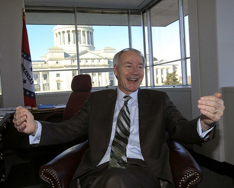 Gov.-elect Asa Hutchinson plans to get busy right away after he’s sworn in. Among his priorities is signing an executive order imposing a hiring freeze so that state agencies reporting to him will be required to get waivers to fill open positions. 