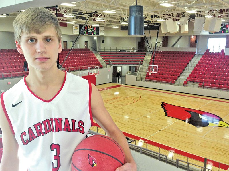 Staff Photo CHIP SOUZA Jeremy Mueller, Farmington senior, has moved from point guard to forward this season after growing three inches in the past year. Mueller and the Cardinals will open their new arena on Friday when they host Greenbrier in 5A-West Conference action.