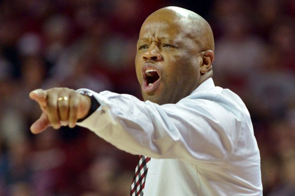 Mike Anderson coaches Arkansas during the second half of the game against Vanderbilt in Bud Walton Arena in Fayetteville on Saturday, Jan. 10, 2015.