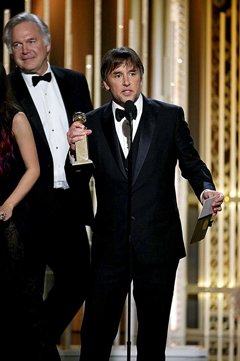 In this image released by NBC, filmmaker Richard Linklater accepts the award for best dramatic film for "Boyhood" at the 72nd Annual Golden Globe Awards on Sunday, Jan. 11, 2015, at the Beverly Hilton Hotel in Beverly Hills, Calif. (AP Photo/NBC, Paul Drinkwater)