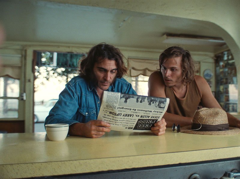 Conway native Jordan Christian Hearn, right, with Joaquin Phoenix in a scene from Inherent Vice