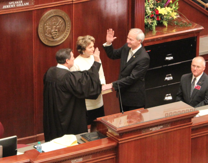 Gov. Asa Hutchinson is sworn into office Tuesday.