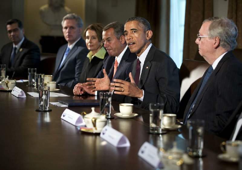 President Barack Obama meets with congressional leaders from both parties Tuesday at the White House, where neither side gave ground on their differences despite pledging to find common ground. 