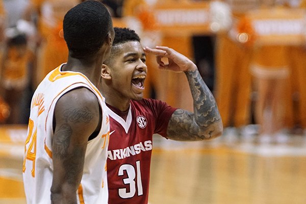 Arkansas' Anton Beard reacts to being fouled on the 3 point shot late in the second half of an NCAA college basketball game Tuesday, Jan. 13, 2015, in Knoxville, Tenn. (AP Photo/Patrick Murphy-Racey)