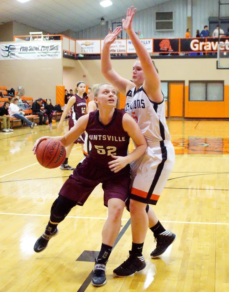 Cierra Creek, Huntsville senior, positions herself to shoot overt Gravette's Amanda Pinter during play in Gravette on Tuesday (Jan. 13, 2015).