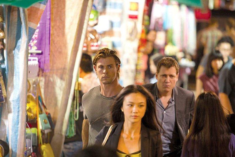 Nicolas Hathaway (Chris Hemsworth), Lien Chen (Wei Tang) and Mark Jessup (Holt McCallany) work to stop a global cybercrime network in Michael Mann’s Blackhat.
