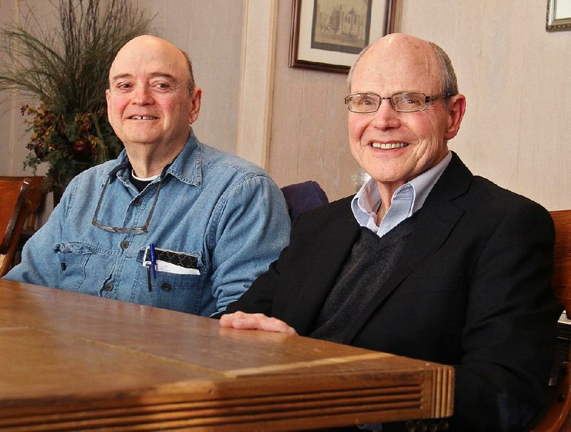 Dale Pekar and Al Schneider organize free English-as-a-second-language classes for St. Edward Catholic Church’s Hispanic parishioners. 