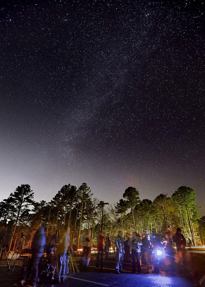 In this 2015 file photo, visitors observe the sky with telescopes during the Sugar Creek Astronomical Society's star party program at Hobbs State Park Conservation Area.
